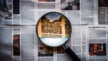 passionate photojournalist, excited, capturing street life, photorealistic, African city bustling with people and markets, highly detailed, moving vehicles and pedestrians, 35mm lens, rich earthy colors, ambient street lighting, shot with a 50mm camera lens.